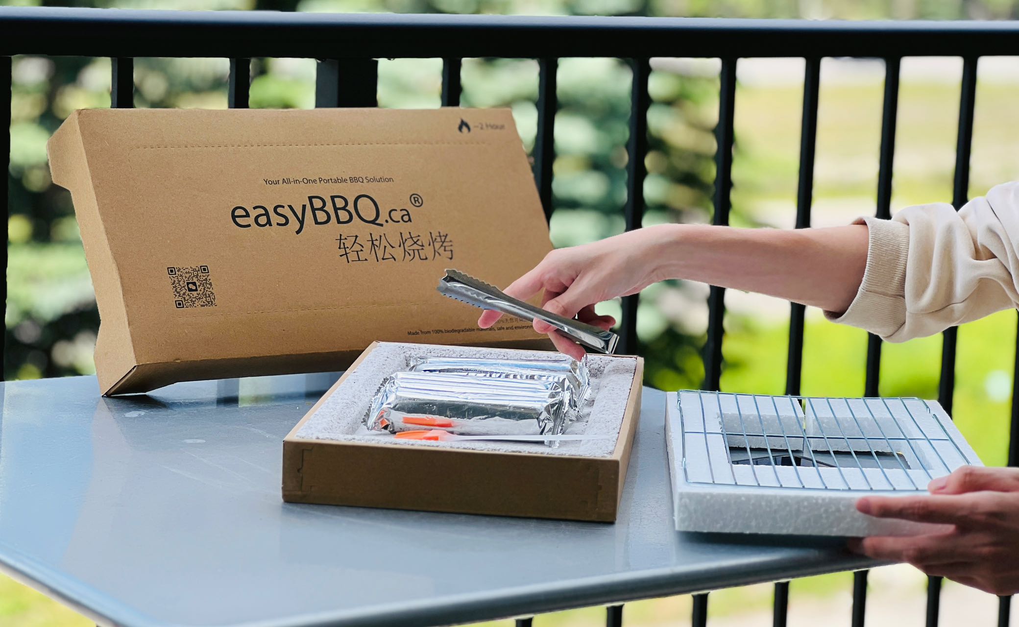 EasyBBQ grill being unpacked outdoors