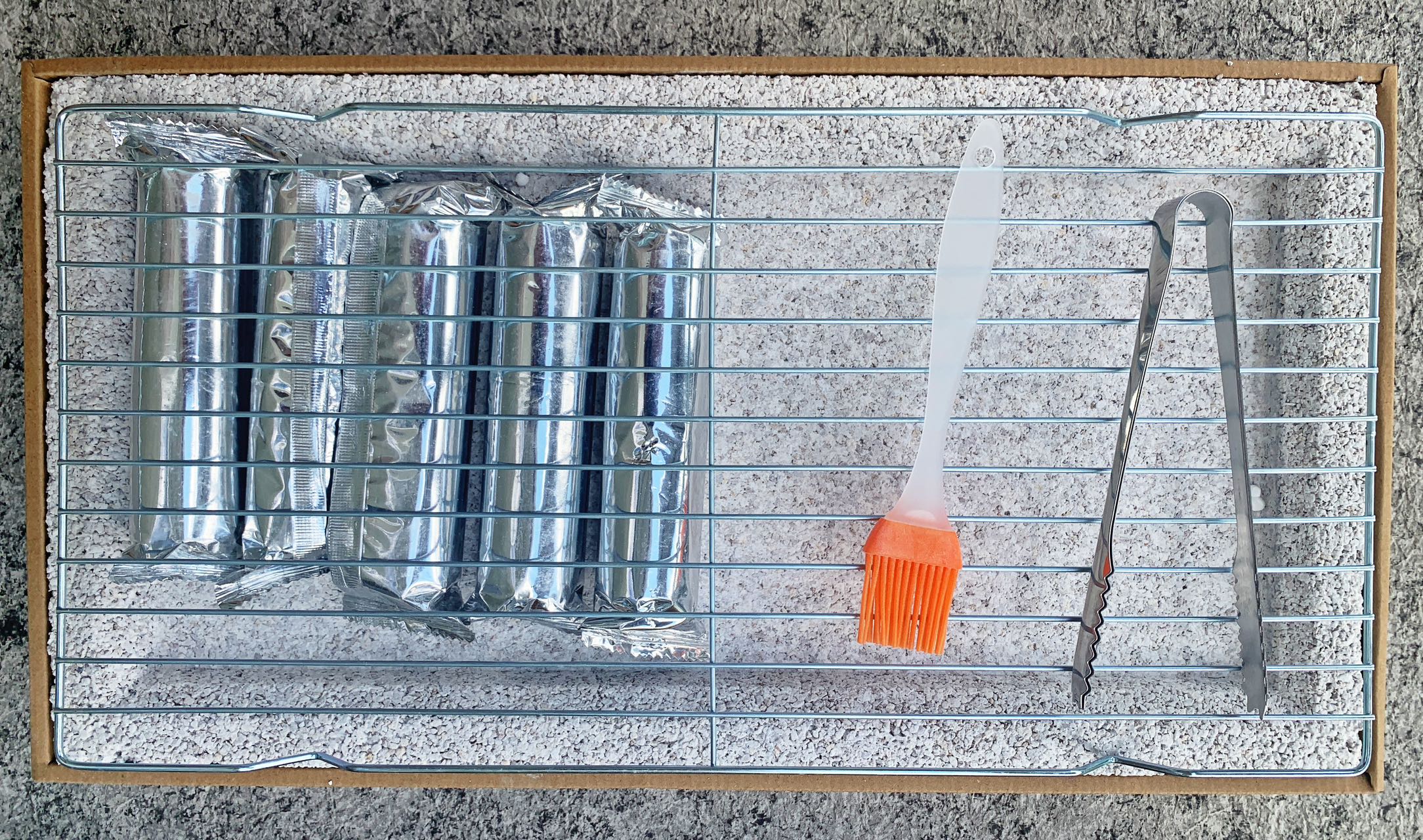 Rack, charcoal, tongs and brush included with EasyBBQ